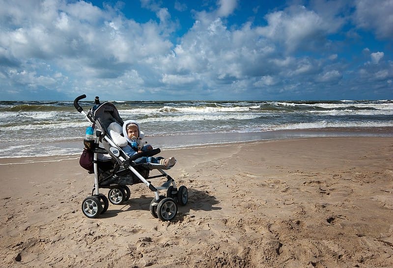 stroller on beach
